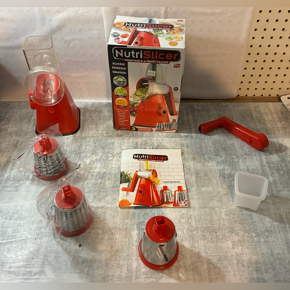 Compact Hand Generated NutriSlicer Vegetable & Fruit Slicer. Never Been Used. $9
